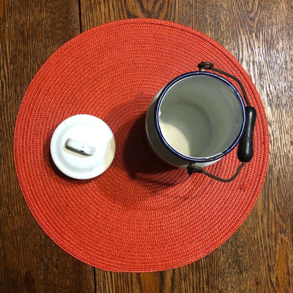 enamel pot with wooden handle and lid